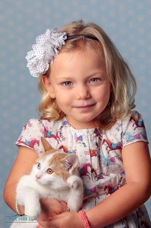 Girl with cat in beautiful studio picture