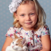 Girl with cat in beautiful studio picture